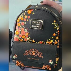Loungefly Coco Backpack with Floral Design